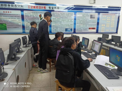 计算机协会成功举办计算机答题竞赛，推动计算机辅助设备技术开发